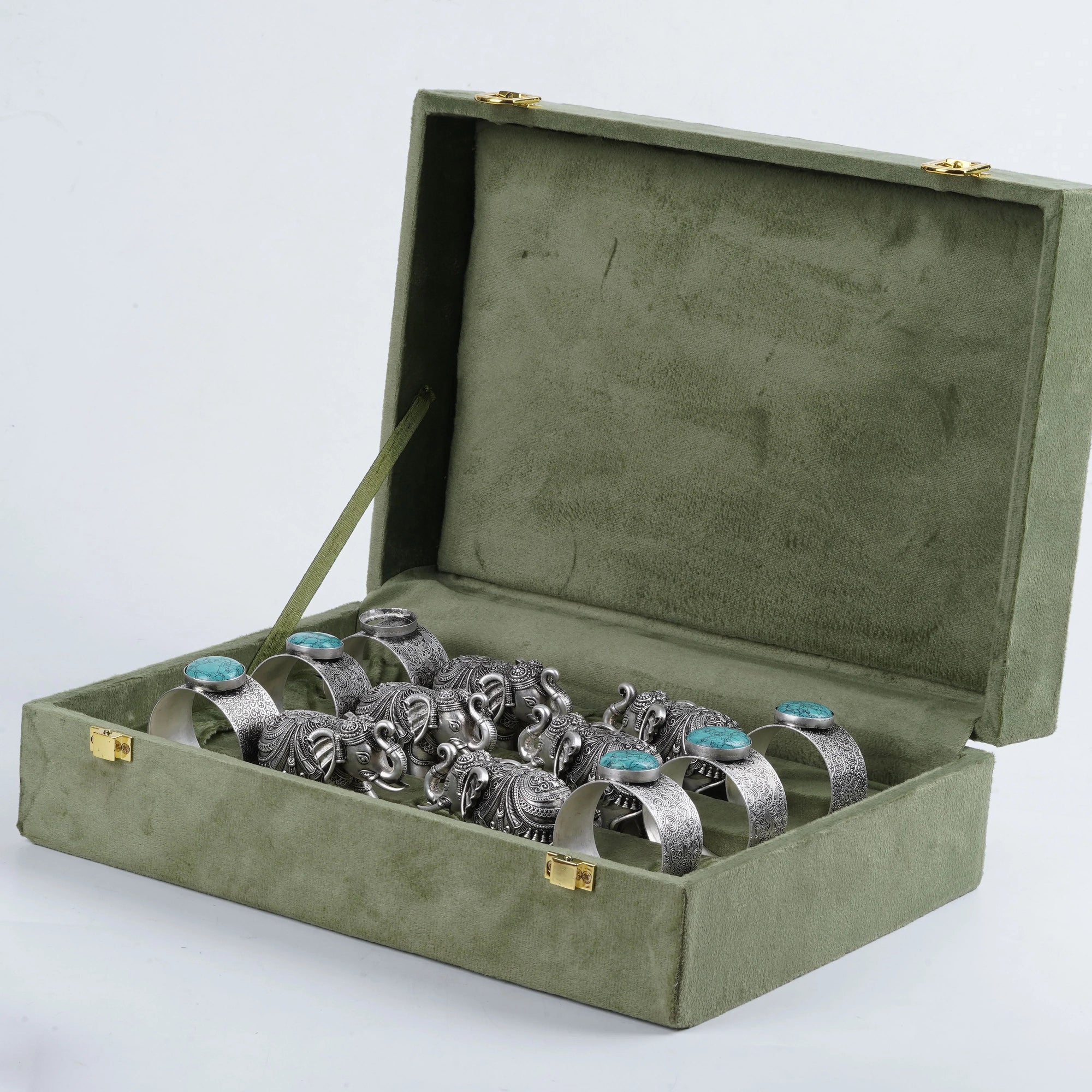 Sabera antique-style silver elephant napkin rings with turquoise stones in green velvet box