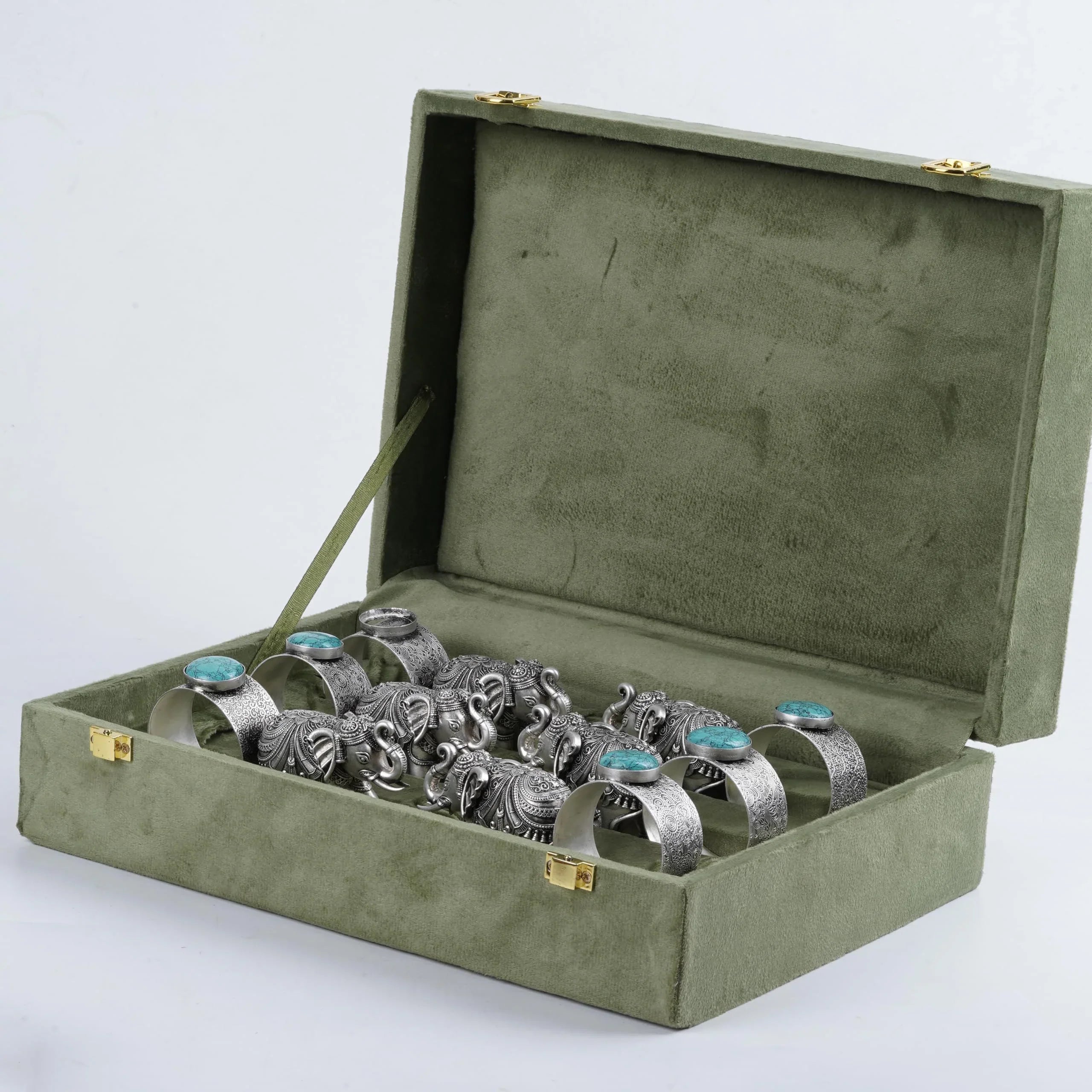 Sabera antique silver elephant napkin rings set in green velvet box, turquoise stone accents