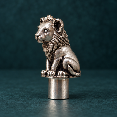 Side view of the Sheru lion cub pencil topper showing the hand-antiqued mane and curled tail