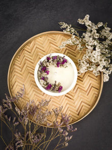 Soy Scented White Candle With White Dry Flowers On Top In A Concrete Jar