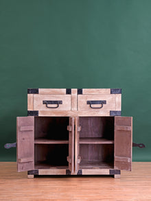 Dramatic Metal Braces Cabinet