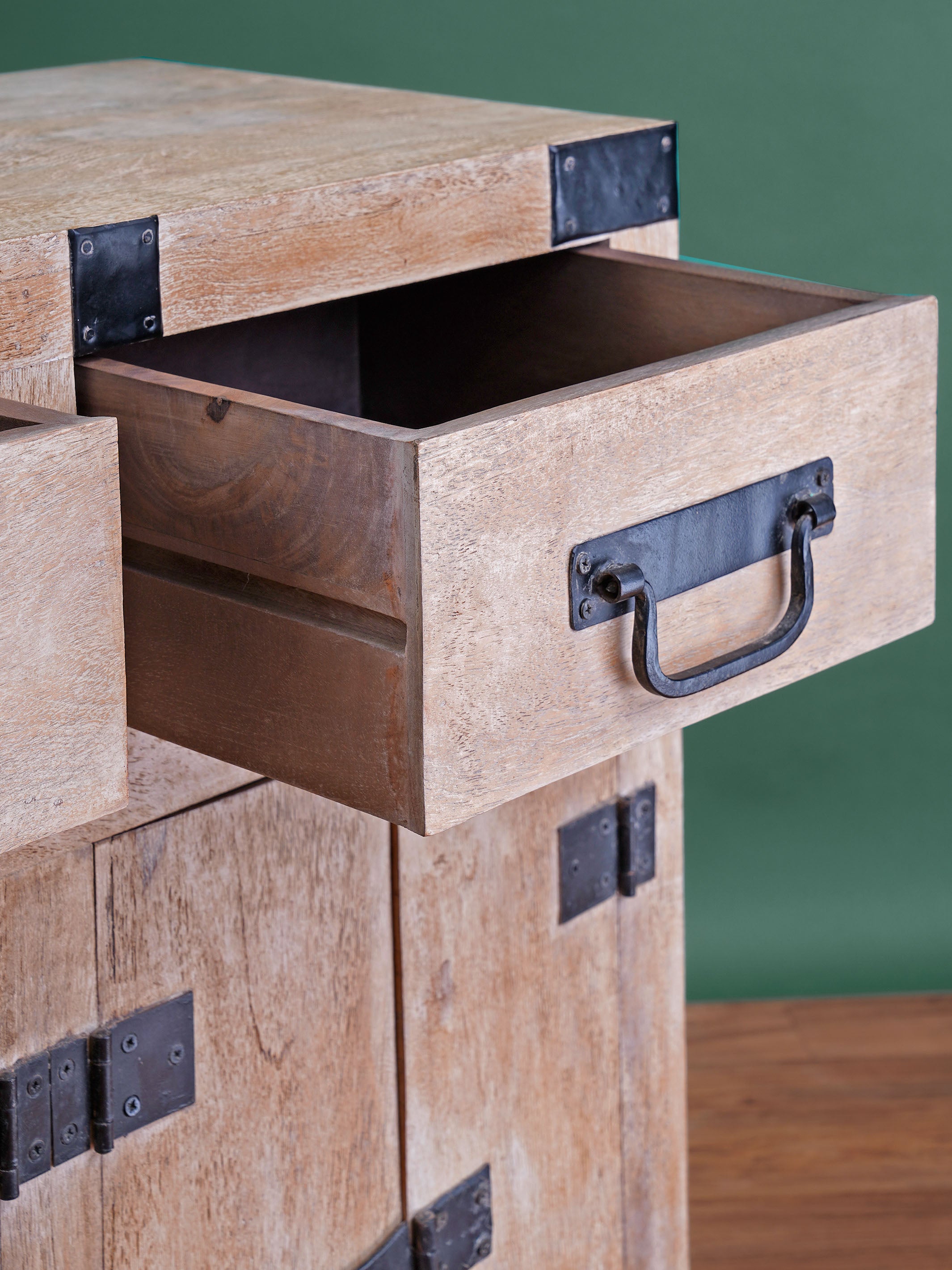 Dramatic Metal Braces Cabinet