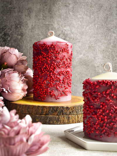 Pillar Candle With Red Dried Flowers